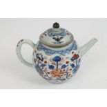 18th century Chinese Imari teapot and cover of bullet form, with strap handle, the domed cover