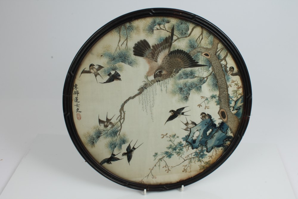 Early 20th century Oriental embroidered silk panel of circular form,
