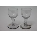 Pair Georgian wine glasses with faceted bowls and diamond facet cut stems on splayed foot, 12.