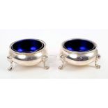 Pair Victorian silver cauldron salts with beaded borders and blue glass liners,