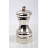 Contemporary silver pepper grinder of capstan form,