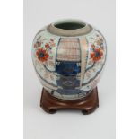 Large 18th century Chinese Imari ginger jar of ovoid form, decorated with flowering chrysanthemums
