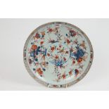 Early 18th century Chinese Imari charger decorated with central circular garden reserve and