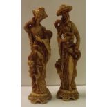 Pair of Carved Resin Figures