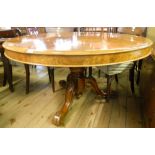 A 4' 4" diameter Victorian walnut breakfast table, set on massive bulbous and studded pillar, with