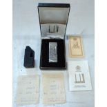 A boxed Dunhill Rollagas lighter with cover, instruction book, guarantee, and receipt from Harrods