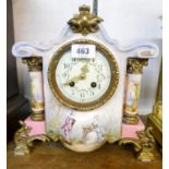 A 19th Century French ornate porcelain cased mantle clock, with gilt metal mounts, flanking