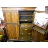 A 4' 7" late Victorian walnut compactum wardrobe by John Watts, with moulded cornice and patented