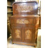 A 36" Oriental carved hardwood cocktail/drinks cabinet with rounded corners, and high relief