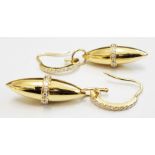 A pair of Boodles 18ct. gold velocity drop ear-rings, with diamond encrusted bands and suspenders,