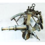 A reproduction Henry Hughes & Son Ltd. brass marine sextant