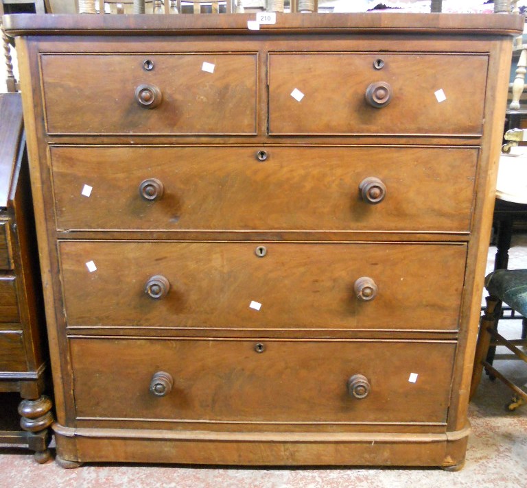 A 3' 9" Victorian mahogany chest with rounded corners, two short and three long graduated drawers,