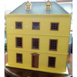 A three storey Georgian style dolls house - 32" frontage - sold with an extensive collection of