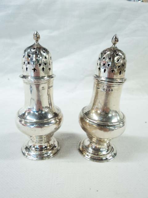 A pair of Victorian silver pepperettes - London 1888