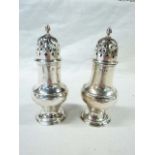 A pair of Victorian silver pepperettes - London 1888
