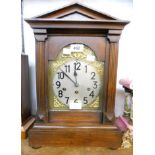 A German stained oak cased mantel clock of architectural design, with Junghans, Wurttemburg, B21.