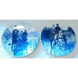 A pair of 15 1/2" 19th Century hand painted blue and white plaques depicting coaching scenes - a/f