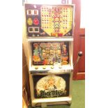 A coin operated fruit machine with black ash effect finish - "Black Magic" by Summitt Coin Ltd. -