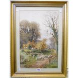 A gilt framed English watercolour, rural scene with shepherd and flock on a track passing cottages -