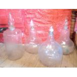 Three gourd shaped clear glass apothecary's jars - sold with a large cylindrical similar -