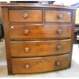 A 3' 7" Victorian mahogany bow front chest of two short and three long graduated drawers, with