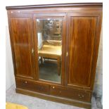 A 4' polished oak dresser with two shelf open plate rack, over a base with two frieze drawers and