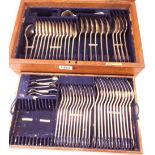 An oak canteen containing a harlequin suite of silver cutlery (mainly rat tail pattern) - various