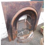A cast iron fire place with grate