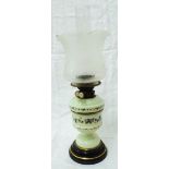 A Victorian table lamp with pale green enamelled glass reservoir, Hinks Duplex burner, glass chimney