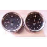 Two matching Smiths M. A. dashboard clocks, rear wind and set, with black dials