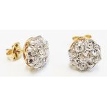 A pair of 18ct. gold nine stone diamond cluster ear-rings (1.90ct.)