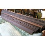 A 7' 1" Victorian stained oak carved and moulded cornice, with acanthus and dentil decoration