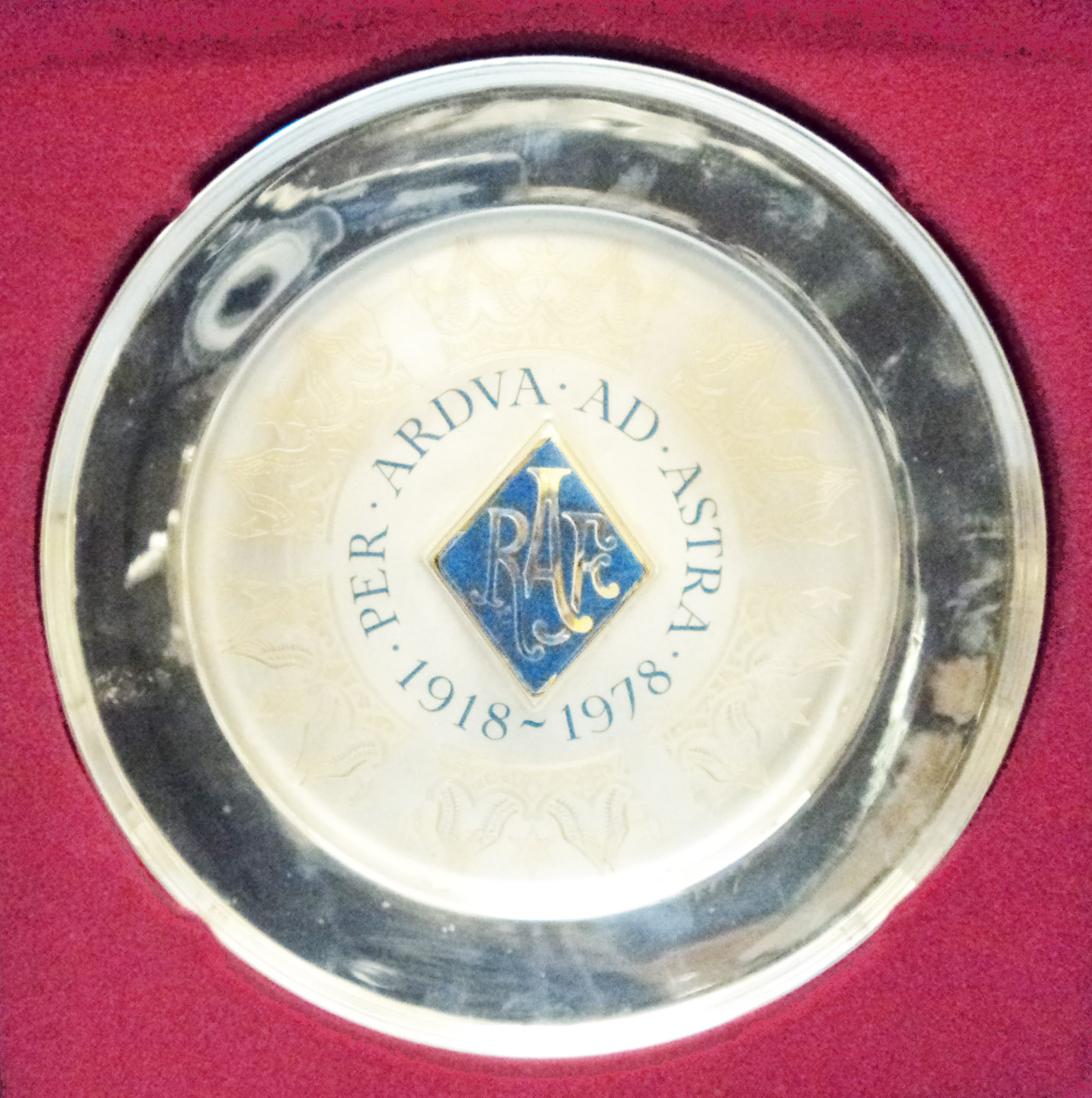 A 10 1/2" diameter silver plaque being a 1978 anniversary RAF commemorative, with central diamond