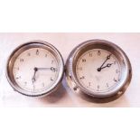 Two matching Smiths M. A. dashboard clocks, rear wind and set, with silvered dials - one housing