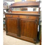 A 4' Edwardian walnut mirror back chiffonier with shelf and flanking turned supports, over two short