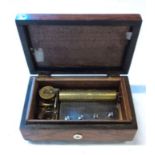 A 19th Century rosewood cased musical box, with front and side slider buttons, base winder and