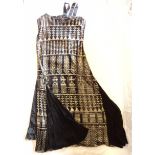 A black and silvered "Flappers" dress with under garment