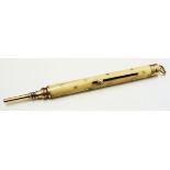 An S. Mordan & Co. pique work star spangled ivory shafted propelling pencil, bearing arrow mark (