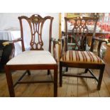 Two Chippendale style elbow chairs, one with brass mounts, the other with ornate pierced splat, both