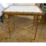 A pair of French Empire style gilt metal side tables with marble tops, pierced gallery and ornate