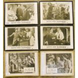 A collection of six framed black and white promotional movie stills - comprising four from "Lets get
