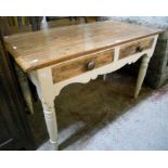 A 4' 1" Victorian pine farmhouse kitchen table, with two frieze drawers and shaped apron, set on