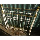 A 4' Victorian painted cast iron and brass bedstead