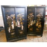 A pair of 24" late 19th Century Oriental lacquered corner cabinets with shelves enclosed by a pair