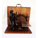 An antique Willcox and Gibbs skeleton chain stitch sewing machine, with original box - serial number