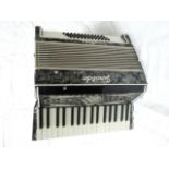 An Italian Geraldo standard accordion, with grey pearlised finish