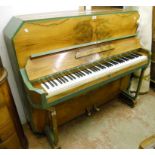 An Art Deco piano in book-matched walnut veneered and partly green painted case, iron framed and