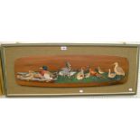 R.T. Grove: a framed painting on oval wood panel depicting a line of various game birds - signed and
