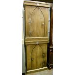 A pair of 21" pine bedside cabinets with shelves enclosed by Gothic arch pattern doors