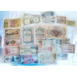 A case containing a quantity of foreign banknotes, including Hong Kong, South America, China,